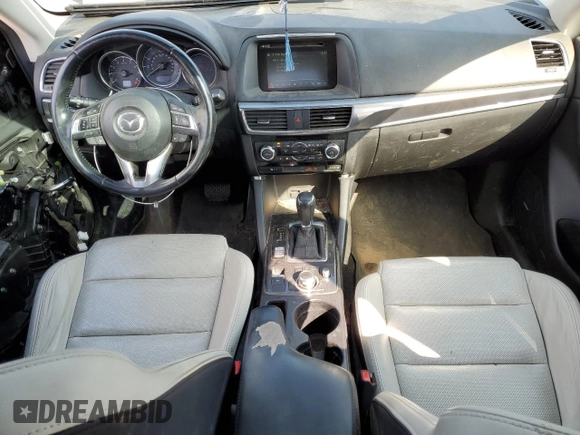 2016 Mazda CX-5 Grand Touring with VIN JM3KE4DY8G0719113, listed as a Copart auction lot 52160285 with 259,365 mi miles and Salvage Title. Bid and sale history available at carsss.com. Image 8.