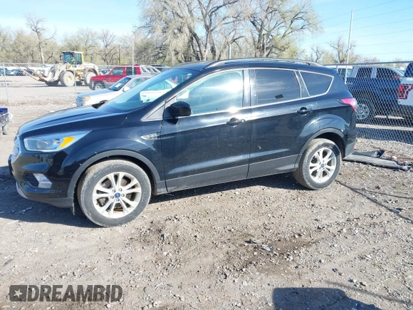 2018 Ford Escape SE z VIN 1FMCU9GD5JUB15259, wystawiony jako IAAI lot #42182040 z przebiegiem 122 194 mil mil oraz . Historia ofert i sprzedaży dostępna na DreamBid. Obrazek 23.