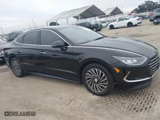 2021 Hyundai Sonata Hybrid SEL with VIN KMHL34JJ1MA024239, listed as a IAAI auction lot 41707290 with 165,214 mi miles. Bid and sale history available at carsss.com. Image 13.