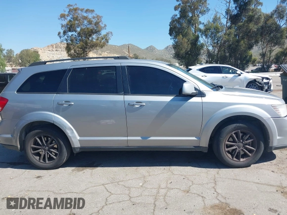 2017 Dodge Journey SXT z VIN 3C4PDCBG0HT530742, wystawiony jako IAAI lot #41997800 z przebiegiem 189 186 mil mil oraz . Historia ofert i sprzedaży dostępna na DreamBid. Obrazek 13.