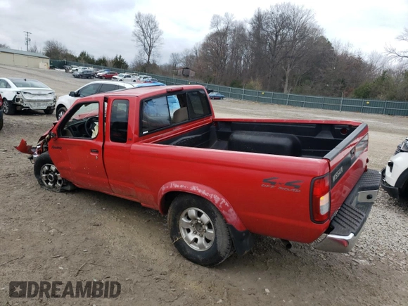 1999 Nissan Frontier XE with VIN 1N6ED26Y4XC313142, listed as a Copart auction lot 85777354 with 122,822 mi miles and Salvage title. Bid and sale history available at DreamBid. Image 2.