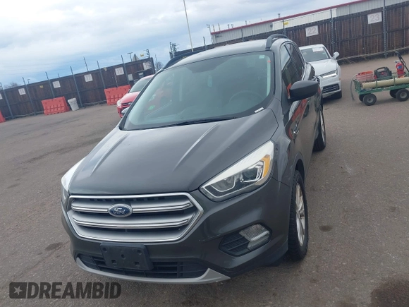 2017 Ford Escape SE with VIN 1FMCU9GD1HUB46034, listed as a IAAI auction lot 41840906 with 143,806 mi miles. Bid and sale history available at carsss.com. Image 12.