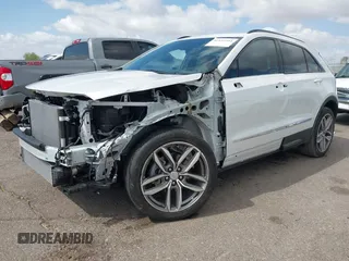 2022 Cadillac XT4 FWD Sport with VIN 1GYFZER44NF164899, listed as a IAAI auction lot 42152554 with 8,058 mi miles and . Bid and sale history available at DreamBid. Image 18.