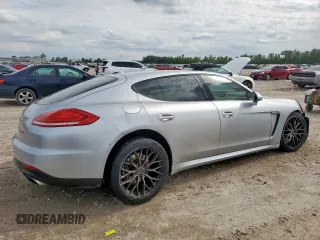 2014 Porsche Panamera с VIN WP0AA2A79EL009620, выставлен на аукционе Copart как лот 58654975 с пробегом 169 322 миль миль и Списание • Salvage title. История ставок и продаж доступна на DreamBid. Изображение 3.