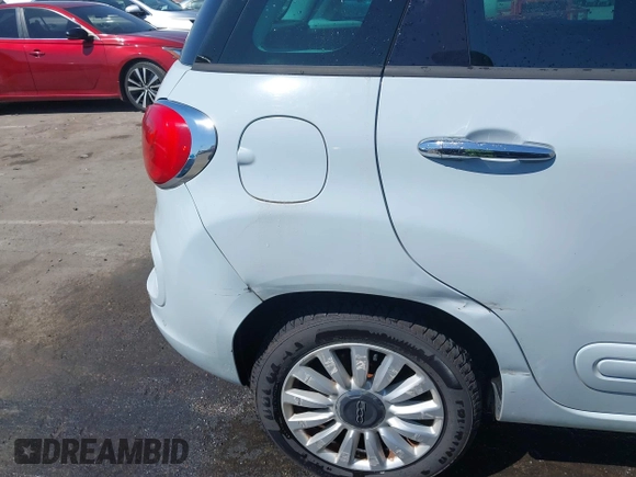 2015 FIAT 500L Easy with VIN ZFBCFABH8FZ031234, listed as a IAAI auction lot 41870102 with 86,267 mi miles and . Bid and sale history available at DreamBid. Image 19.