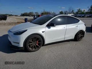 2021 Tesla Model Y Performance with VIN 5YJYGDEF3MF262878, listed as a Copart auction lot 52897595 with 50,939 mi miles and Salvage Title. Bid and sale history available at DreamBid. Image 1.