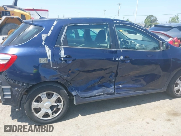 2009 Toyota Matrix with VIN 2T1KU40E99C119135, listed as a IAAI auction lot 42136716 with 185,155 mi miles. Bid and sale history available at carsss.com. Image 6.