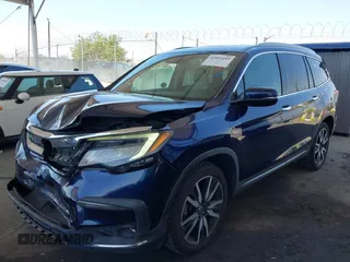 2019 Honda Pilot Touring 8-Passenger z VIN 5FNYF5H97KB013530, wystawiony jako IAAI lot #42403449 z przebiegiem 90 557 mil mil oraz . Historia ofert i sprzedaży dostępna na DreamBid. Obrazek 17.