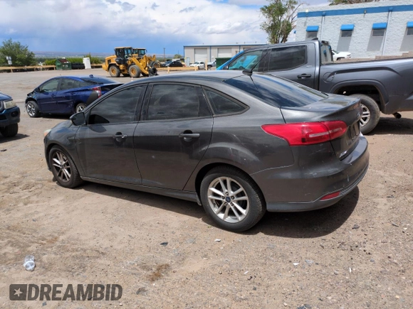 2015 Ford Focus SE with VIN 1FADP3F29FL328828, listed as a Copart auction lot 56420505 with 149,675 mi miles and Salvage title. Bid and sale history available at DreamBid. Image 2.