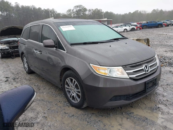 2011 Honda Odyssey EX-L with VIN 5FNRL5H6XBB100535, listed as a IAAI auction lot 41544196 with 261,000 mi miles. Bid and sale history available at carsss.com. Image 1.