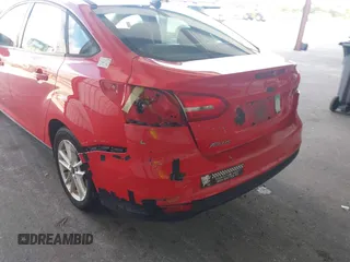 2017 Ford Focus SE with VIN 1FADP3F2XHL221516, listed as a IAAI auction lot 42102077 with 58,596 mi miles and . Bid and sale history available at DreamBid. Image 6.