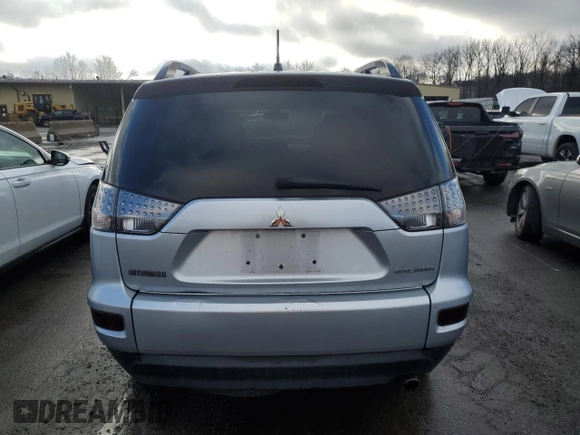 2013 Mitsubishi Outlander SE z VIN JA4JT3AW8DU014284, wystawiony jako Copart lot #85062254 z przebiegiem 167 630 mil mil oraz Czysty tytuł • Clean title. Historia ofert i sprzedaży dostępna na DreamBid. Obrazek 6.