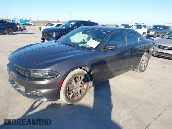 2015 Dodge Charger SXT z VIN 2C3CDXJG1FH746276, wystawiony jako IAAI lot #40925452 z przebiegiem 121 070 mil mil oraz . Historia ofert i sprzedaży dostępna na DreamBid. Obrazek 19.
