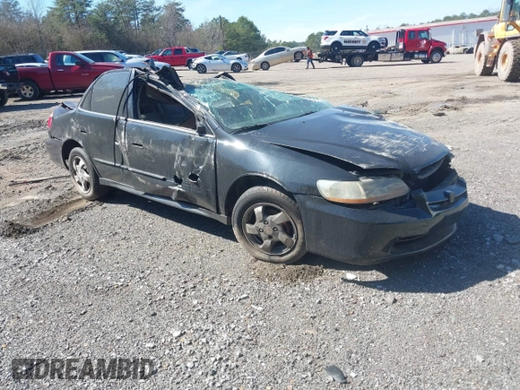 2002 Honda Accord LX with VIN 1HGCG56422A010978, listed as a IAAI auction lot 41639059 with 386,221 mi miles and . Bid and sale history available at DreamBid. Image 1.
