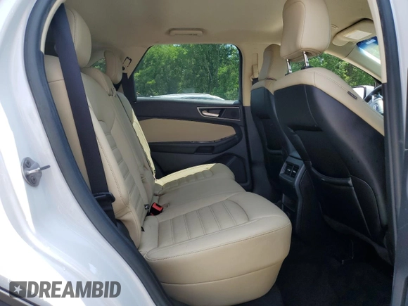 2020 Ford Edge SEL z VIN 2FMPK3J99LBA57125, wystawiony jako Copart lot #59915095 z przebiegiem 101 081 mil mil oraz Szkoda całkowita • Salvage title. Historia ofert i sprzedaży dostępna na DreamBid. Obrazek 11.