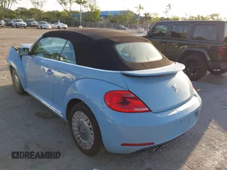 2013 Volkswagen Beetle 2.5L with VIN 3VW5P7AT0DM812482, listed as a IAAI auction lot 42103987 with 105,513 mi miles and . Bid and sale history available at DreamBid. Image 12.