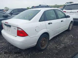 2005 Ford Focus S с VIN 1FAFP34N55W206048, выставлен на аукционе IAAI как лот 42293744 с пробегом Не указан миль и . История ставок и продаж доступна на DreamBid. Изображение 4.