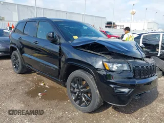 2021 Jeep Grand Cherokee Laredo E with VIN 1C4RJEAG0MC571375, listed as a IAAI auction lot 42087648 with 29,358 mi miles and . Bid and sale history available at DreamBid. Image 1.