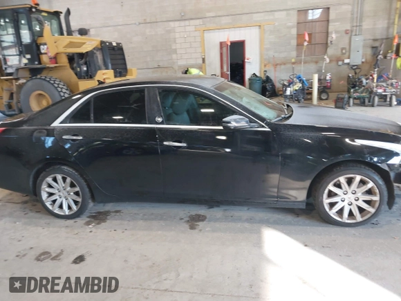 2014 Cadillac CTS Luxury AWD with VIN 1G6AX5S31E0143179, listed as a IAAI auction lot 41421639 with 135,810 mi miles and . Bid and sale history available at DreamBid. Image 13.