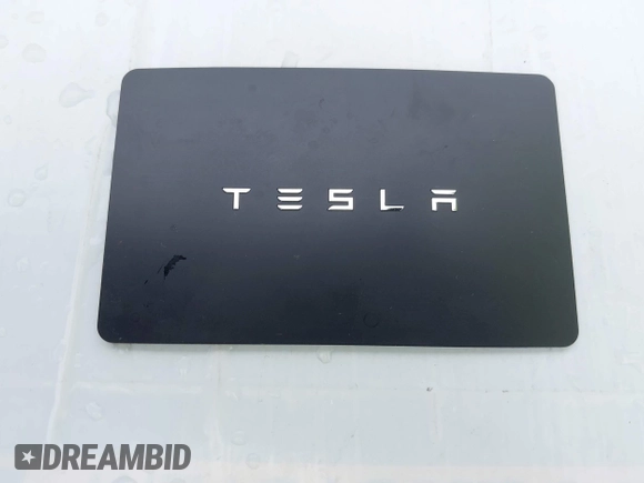 2018 Tesla Model 3 Long Range Battery z VIN 5YJ3E1EB2JF087823, wystawiony jako IAAI lot #41903609 z przebiegiem 69 749 mil mil oraz . Historia ofert i sprzedaży dostępna na DreamBid. Obrazek 11.