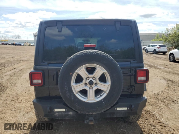 2023 Jeep Wrangler Sport S with VIN 1C4HJXDN9PW564543, listed as a Copart auction lot 56192945 with 42,015 mi miles and Salvage title. Bid and sale history available at DreamBid. Image 6.