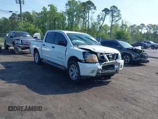 2013 Nissan Titan SL with VIN 1N6BA0ED0DN301312, listed as a IAAI auction lot 42152393 with 102,191 mi miles and . Bid and sale history available at DreamBid. Image 1.