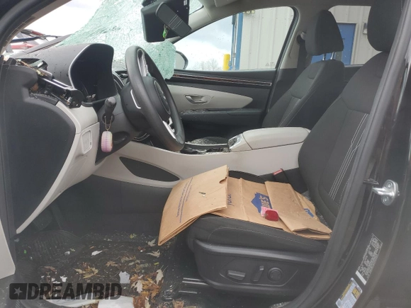 2023 Hyundai Tucson SEL with VIN 5NMJBCAE2PH270674, listed as a Copart auction lot 82879614 with 11,673 mi miles and Salvage Title. Bid and sale history available at DreamBid. Image 7.