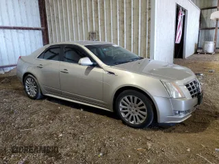 2013 Cadillac CTS Performance with VIN 1G6DK5E30D0157791, listed as a Copart auction lot 83798544 with 124,638 mi miles and Salvage Title. Bid and sale history available at DreamBid. Image 4.