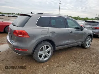 2011 Volkswagen Touareg Sport z VIN WVGFK9BP5BD001915, wystawiony jako Copart lot #58965625 z przebiegiem 181 765 mil mil oraz Szkoda całkowita • Salvage title. Historia ofert i sprzedaży dostępna na DreamBid. Obrazek 3.