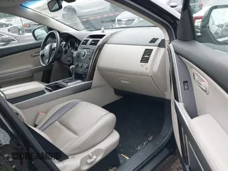 2012 Mazda CX-9 Grand Touring z VIN JM3TB2DAXC0338667, wystawiony jako IAAI lot #42260820 z przebiegiem 138 111 mil mil oraz . Historia ofert i sprzedaży dostępna na DreamBid. Obrazek 5.