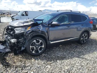 2018 Honda CR-V Touring with VIN 2HKRW2H95JH617435, listed as a Copart auction lot 51642445 with 82,698 mi miles and Salvage Title. Bid and sale history available at carsss.com. Image 1.
