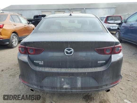2019 Mazda 3 Premium with VIN JM1BPBEMXK1119599, listed as a Copart auction lot 71036504 with 61,371 mi miles and Salvage Title. Bid and sale history available at DreamBid. Image 6.