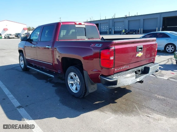 2014 Chevrolet Silverado 1500 LTZ with VIN 3GCUKSEC5EG364458, listed as a IAAI auction lot 41857739 with 85,042 mi miles. Bid and sale history available at carsss.com. Image 3.