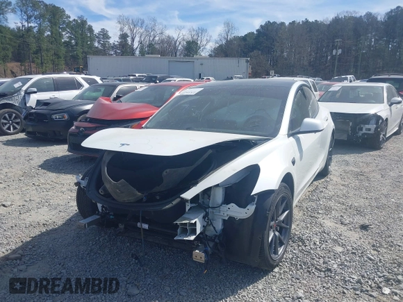 2022 Tesla Model 3 Long Range with VIN 5YJ3E1EB0NF106570, listed as a IAAI auction lot 41832622 with 52,679 mi miles and . Bid and sale history available at DreamBid. Image 19.