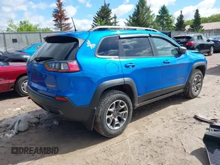 2020 Jeep Cherokee Trailhawk with VIN 1C4PJMBXXLD636547, listed as a IAAI auction lot 42314654 with 59,061 mi miles and . Bid and sale history available at DreamBid. Image 4.