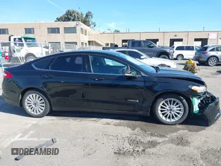 2015 Ford Fusion SE Hybrid with VIN 3FA6P0LU9FR294551, listed as a IAAI auction lot 41545007 with 179,906 mi miles. Bid and sale history available at carsss.com. Image 14.