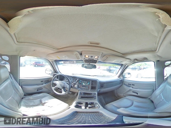 2004 Chevrolet Suburban LT z VIN 1GNEC16Z34J242670, wystawiony jako Copart lot #60987725 z przebiegiem 277 961 mil mil oraz Szkoda całkowita • Salvage title. Historia ofert i sprzedaży dostępna na DreamBid. Obrazek 16.