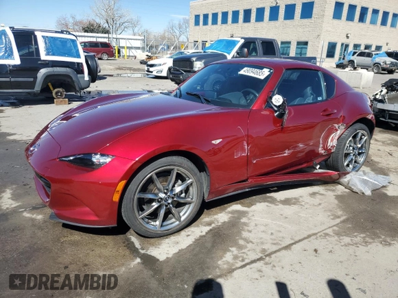 2022 Mazda MX-5 Miata Grand Touring z VIN JM1NDAM76N0508438, wystawiony jako Copart lot #49094685 z przebiegiem 19 201 mil mil oraz Szkoda całkowita • Salvage title. Historia ofert i sprzedaży dostępna na DreamBid. Obrazek 1.