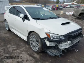 2016 Subaru WRX STI z VIN JF1VA2V63G9818135, wystawiony jako IAAI lot #41465148 z przebiegiem 52 000 mil mil oraz . Historia ofert i sprzedaży dostępna na DreamBid. Obrazek 1.