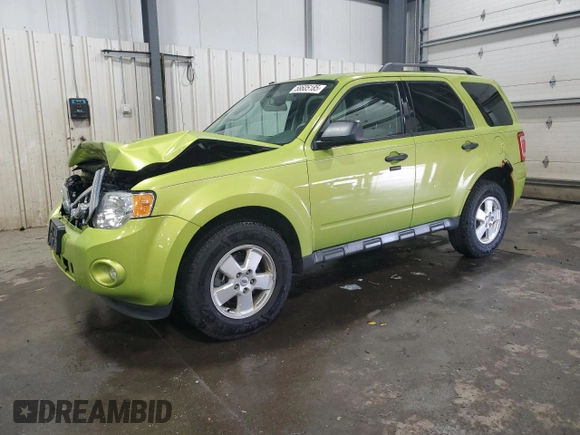 2012 Ford Escape XLT with VIN 1FMCU9D7XCKA07488, listed as a Copart auction lot 58605185 with 144,578 mi miles and Salvage title. Bid and sale history available at DreamBid. Image 1.