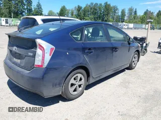 2014 Toyota Prius Four with VIN JTDKN3DU7E1742714, listed as a IAAI auction lot 42637235 with 184,734 mi miles and . Bid and sale history available at DreamBid. Image 4.