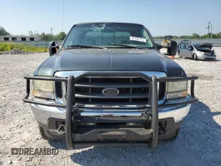 2004 Ford F-250 XL with VIN 1FTNW21P24EC97664, listed as a Copart auction lot 62030175 with 222,855 mi miles and Salvage title. Bid and sale history available at DreamBid. Image 5.