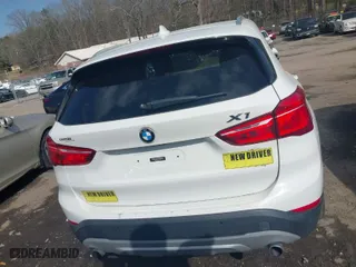 2017 BMW X1 xDrive28i with VIN WBXHT3Z30H4A64932, listed as a IAAI auction lot 41779359 with 72,612 mi miles. Bid and sale history available at carsss.com. Image 17.