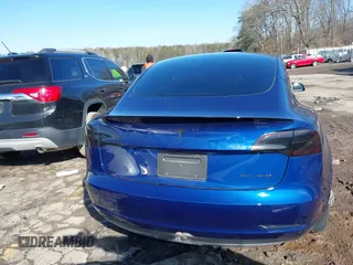 2023 Tesla Model 3 Long Range with VIN 5YJ3E1EB0PF688172, listed as a IAAI auction lot 41411580 with 21,125 mi miles and . Bid and sale history available at DreamBid. Image 16.