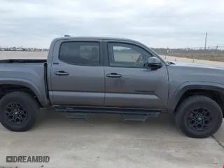 2021 Toyota Tacoma 2WD SR5 with VIN 5TFAZ5CN4MX113767, listed as a IAAI auction lot 41233626 with 52,859 mi miles. Bid and sale history available at carsss.com. Image 13.