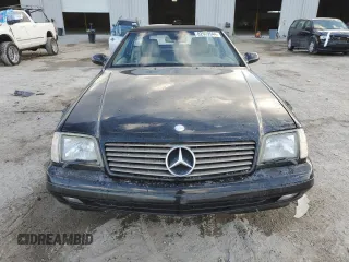 1999 Mercedes-Benz SL-Class with VIN WDBFA68F0XF186163, listed as a Copart auction lot 82669544 with 184,054 mi miles and Salvage Title. Bid and sale history available at carsss.com. Image 5.