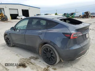 2021 Tesla Model Y Long Range z VIN 5YJYGDEE9MF067651, wystawiony jako Copart lot #55758165 z przebiegiem 61 348 mil mil oraz Czysty tytuł • Clean title. Historia ofert i sprzedaży dostępna na DreamBid. Obrazek 2.