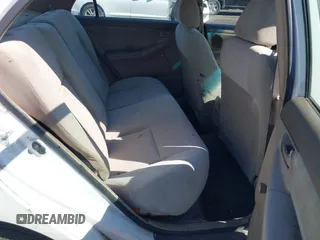 2005 Toyota Corolla CE with VIN JTDBR32E050056617, listed as a IAAI auction lot 41749530 with 299,999 mi miles and . Bid and sale history available at DreamBid. Image 8.