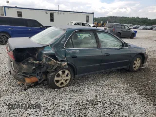 2000 Honda Accord SE with VIN 1HGCG5677YA049486, listed as a Copart auction lot 58548565 with 267,067 mi miles and Salvage title. Bid and sale history available at DreamBid. Image 3.