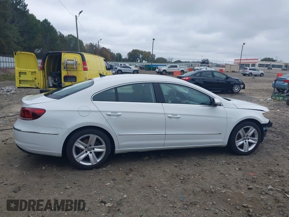 2016 Volkswagen CC Sport with VIN WVWBN7AN4GE512547, listed as a IAAI auction lot 40802001 with 94,513 mi miles. Bid and sale history available at carsss.com. Image 14.